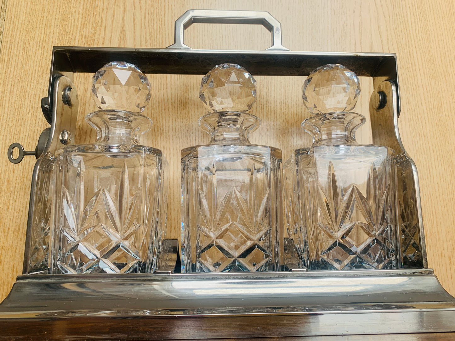 Art Deco Triple Tantalus Decanter Set – Silver Plate & Brilliant Cut Crystal (c. 1920s)