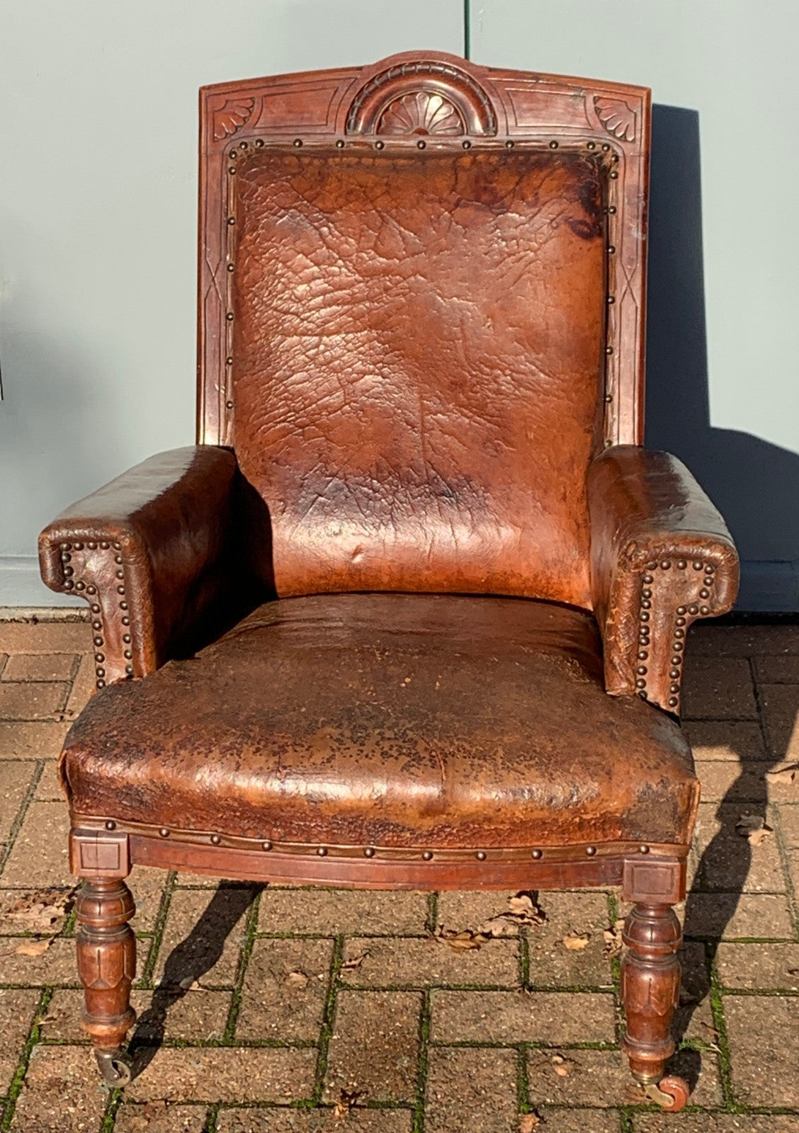 Antique Victorian Leather Library Chair on Castors c 1840's