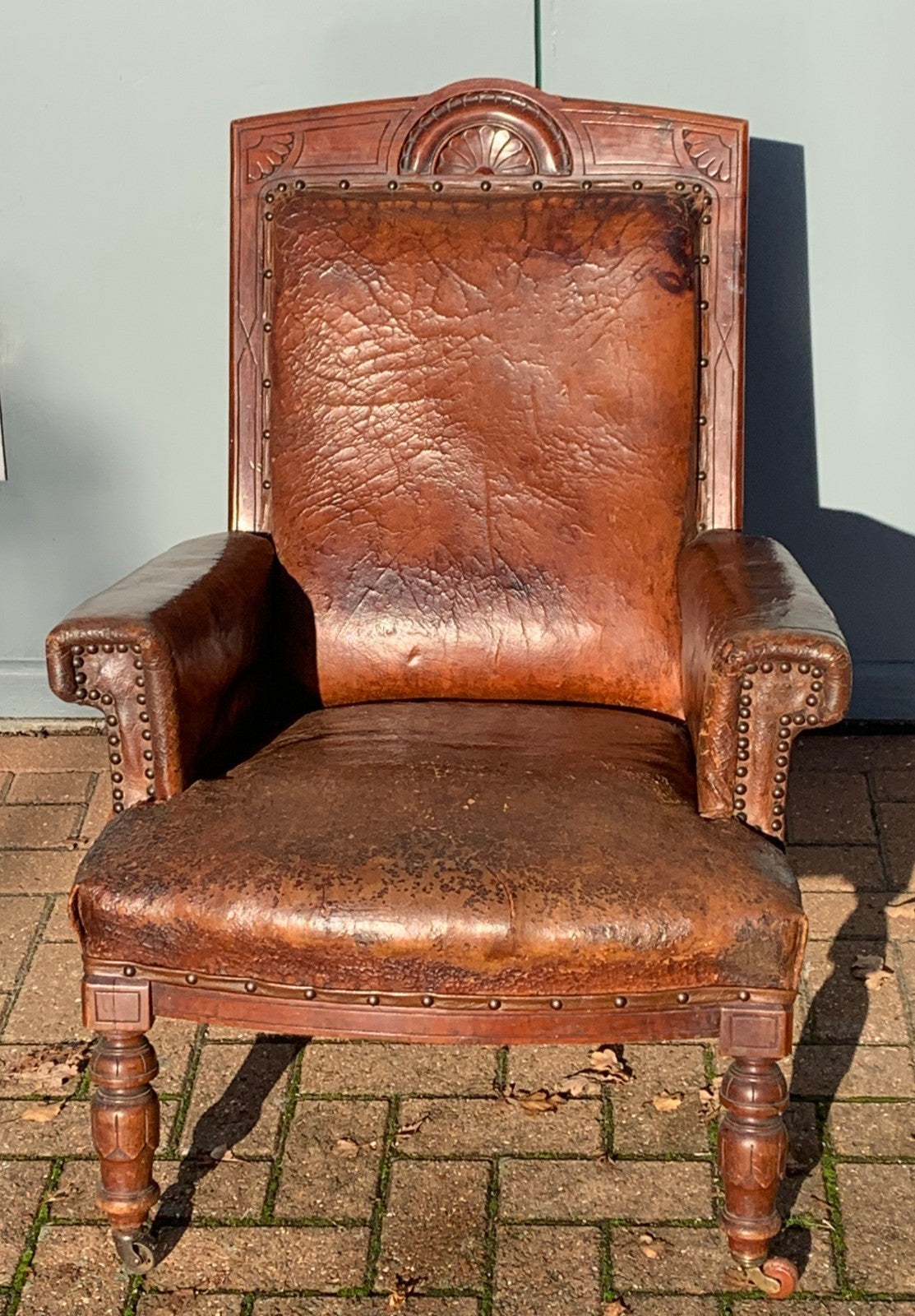 Antique Victorian Leather Library Chair on Castors c 1840's