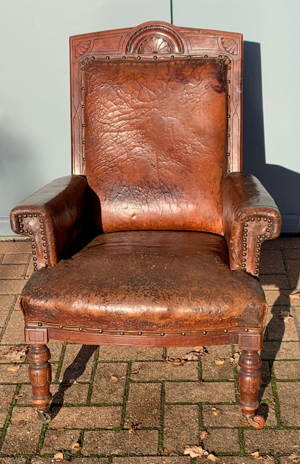 Antique Victorian Leather Library Chair on Castors c 1840's