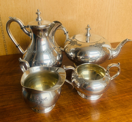 Edwardian Art Nouveau Silver Plate Four-Piece Tea Service by James Dixon & Sons. c. 1890–1910