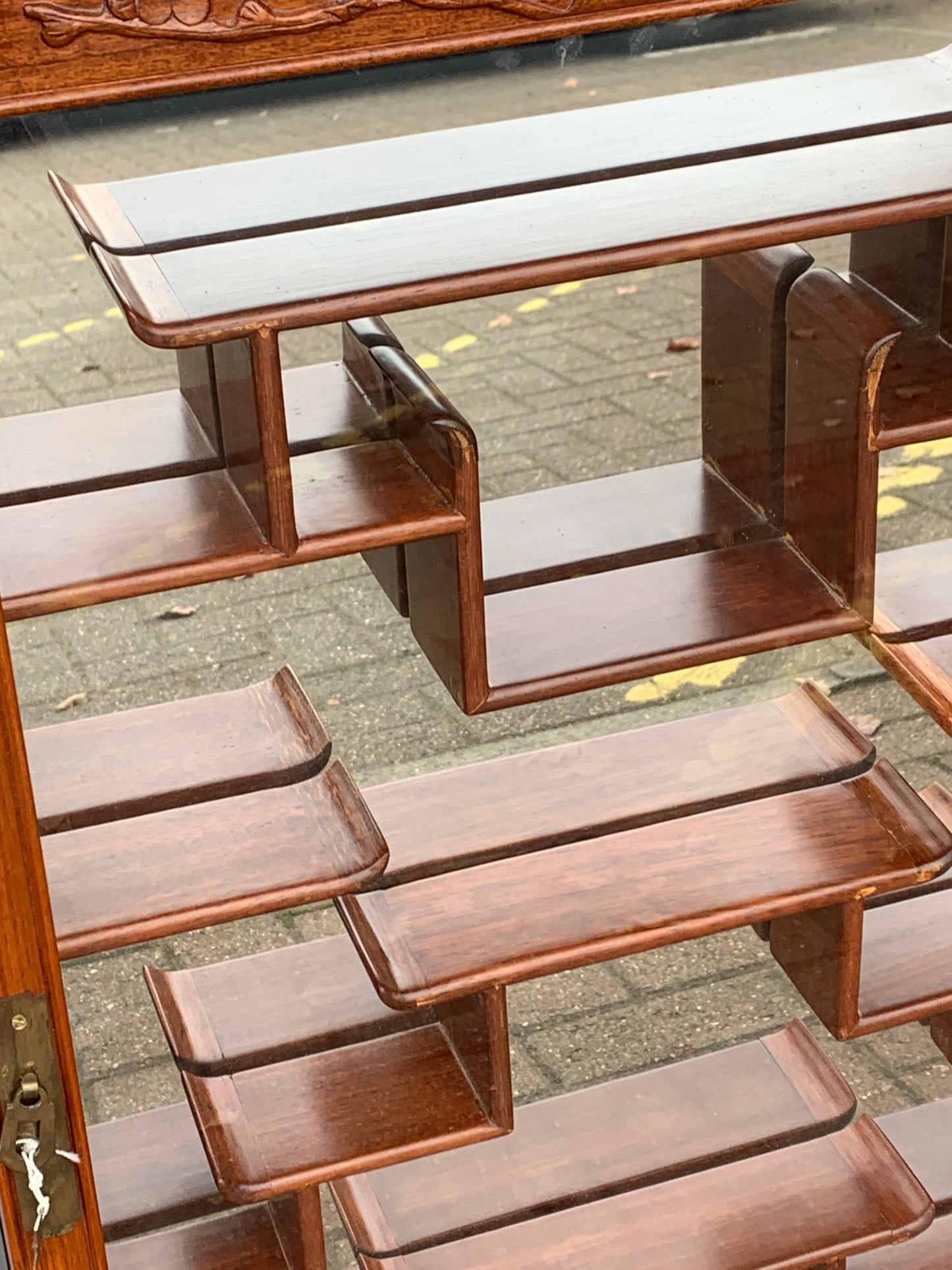 Oriental Hardwood 'Puzzle' Display Cabinet with Mirrored Back with Lock & Key.