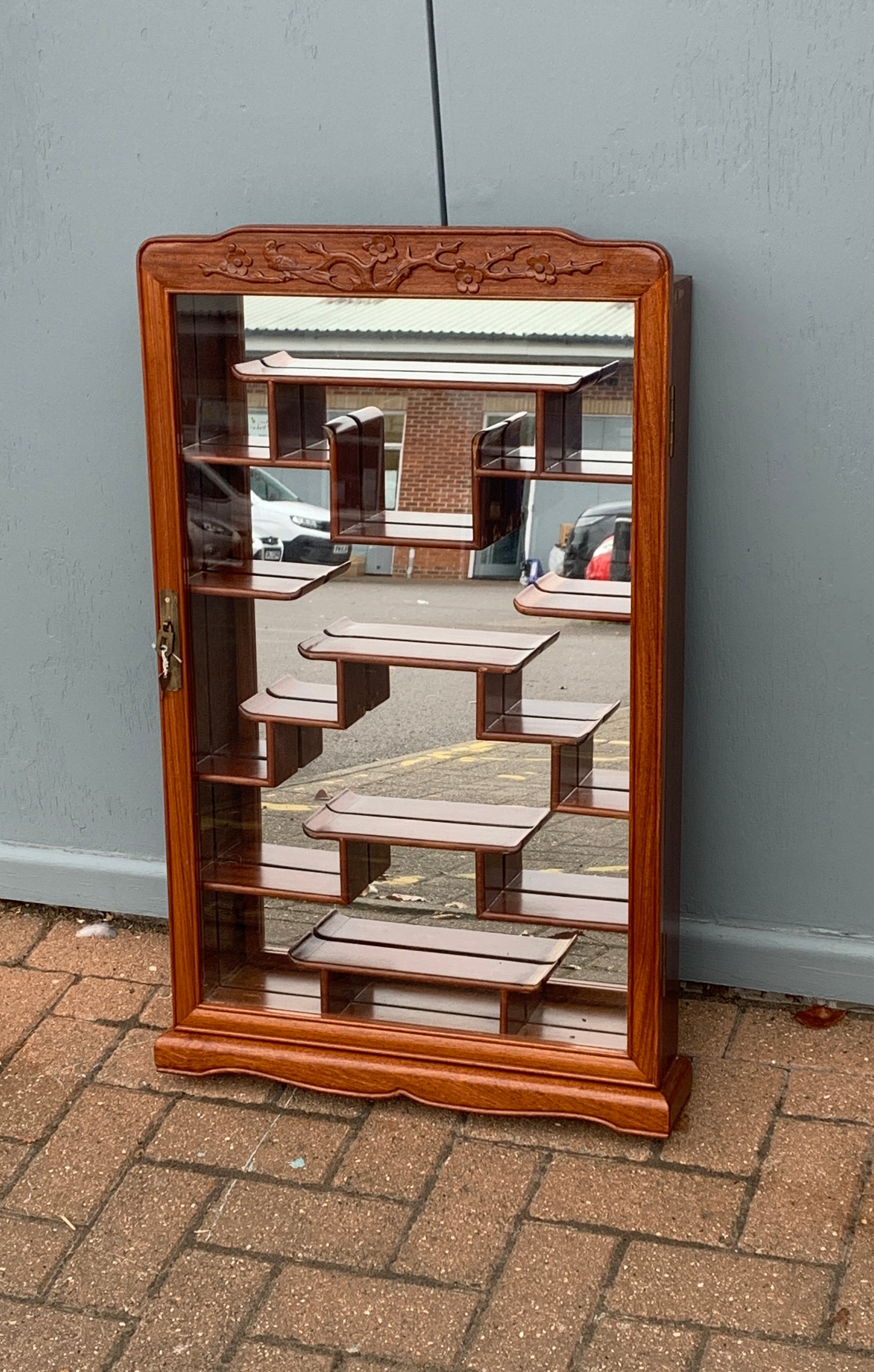Oriental Hardwood 'Puzzle' Display Cabinet with Mirrored Back with Lock & Key.