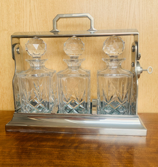 Art Deco Triple Tantalus Decanter Set – Silver Plate & Brilliant Cut Crystal (c. 1920s)